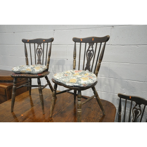 1232 - AN OAK BARLEY TWIST GATE LEF TABLE, width 42cm x depth 107cm x height 73cm, five spindle back chairs... 