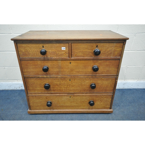 1239 - AN EARLY 20TH CENTURY OAK CHEST OF TWO SHORT OVER THREE LONG GRADUATED DRAWERS, with turned ebonised... 