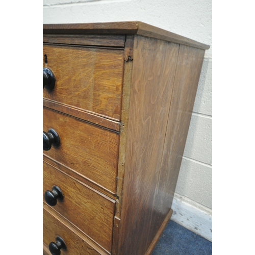 1239 - AN EARLY 20TH CENTURY OAK CHEST OF TWO SHORT OVER THREE LONG GRADUATED DRAWERS, with turned ebonised... 