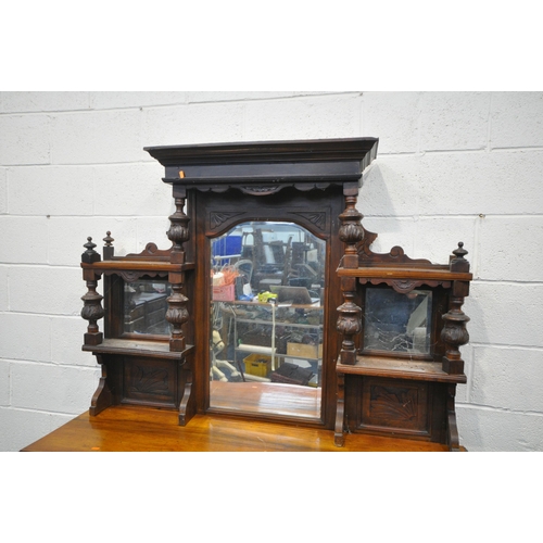 1251 - AN EDWARDIAN WALNUT MIRRORBACK, with an arrangement of mirrors, drawers and cupboard, width 149cm x ... 