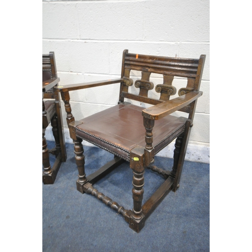 1253 - TWO SIMILAR STAINED OAK TUDOR STYLE OPEN ARMCHAIRS, with studded seats (condition report: frames sol... 