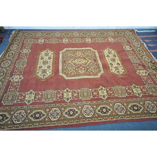 1274 - A LARGE WOOLLEN FLORAL RED AND GOLD RUG, 338cm x 247cm, and a blue wool carpet runner (condition rep... 