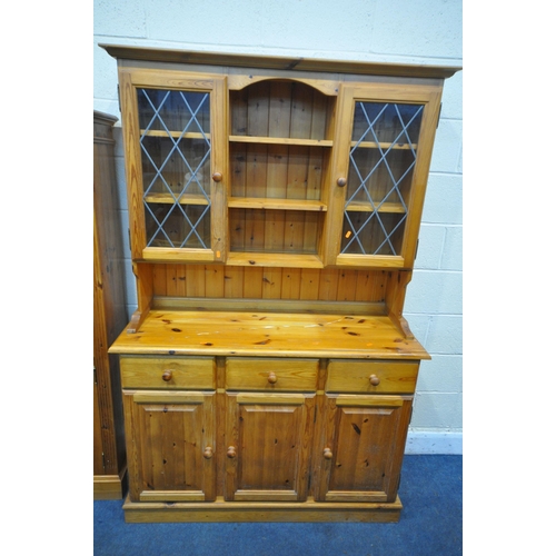 1281 - A MODERN PINE DRESSER, with three drawers, width 123cm x depth 43cm x height 188cm x height of base ... 