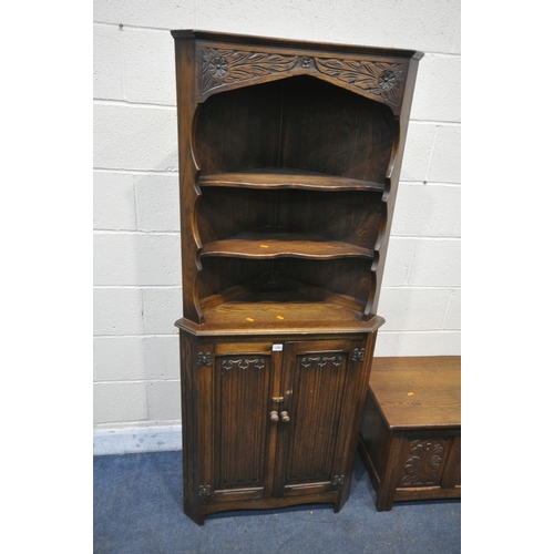 1293 - A 20TH CENTURY OAK BLANKET CHEST, with foliate and linenfold detail, along with a linenfold oak corn... 