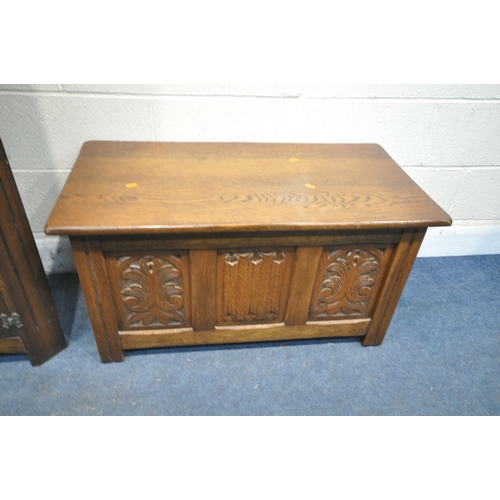 1293 - A 20TH CENTURY OAK BLANKET CHEST, with foliate and linenfold detail, along with a linenfold oak corn... 