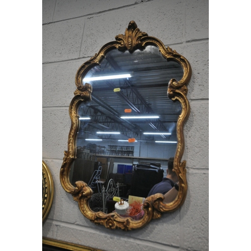 1294 - AN ATTWELL GILT WOOD FRAMED BEVELLED EDGE WALL MIRROR, a gilt and ebonised wall mirror, a rectangula... 