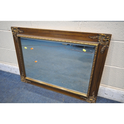 1294 - AN ATTWELL GILT WOOD FRAMED BEVELLED EDGE WALL MIRROR, a gilt and ebonised wall mirror, a rectangula... 