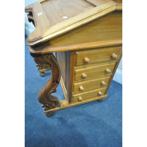 1298 - A REPRODUCTION PINE DAVENPORT, with a hinged lid and storage compartment, and four drawers to right ... 