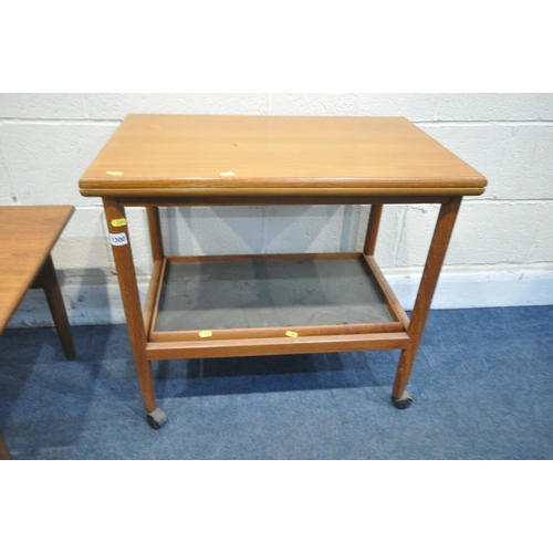 1300 - A MID-CENTURY TORBEN ORSKOV & CO TEAK CIRCULAR TWO TIER FOLDING SIDE TABLE, with two coloured trays,... 