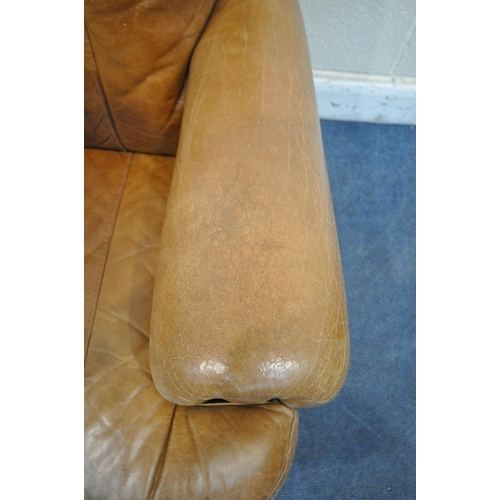 1315 - A TAN STUDDED LEATHER THREE SEATER SETTEE, length 184cm (condition report: cracks to arm rests, seat... 