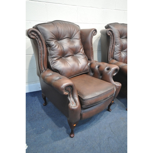 1316 - A DARK BROWN LEATHER THREE PIECE CHESTERFIELD LOUNGE SUITE, comprising a winged three seater settee,... 