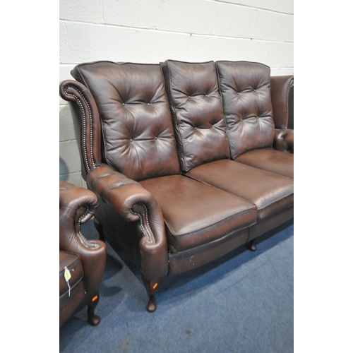 1316 - A DARK BROWN LEATHER THREE PIECE CHESTERFIELD LOUNGE SUITE, comprising a winged three seater settee,... 