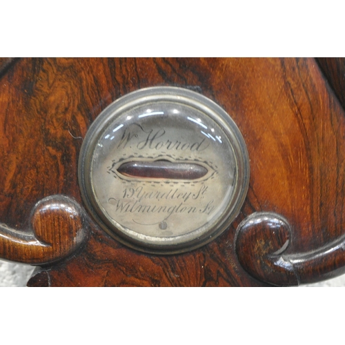 1323 - A VICTORIAN FLAME MAHOGANY WHEEL BAROMETER, signed W Horrod of 19 Yardley street, Wilmington, height... 