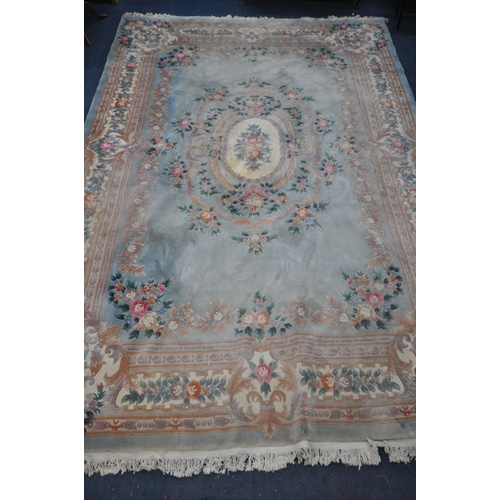 1326 - A VERY LARGE CHINESE WOOLLEN RUG, 540cm x 359cm (condition report: stains in various places, sides a... 