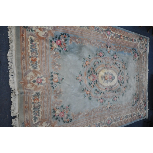 1326 - A VERY LARGE CHINESE WOOLLEN RUG, 540cm x 359cm (condition report: stains in various places, sides a... 