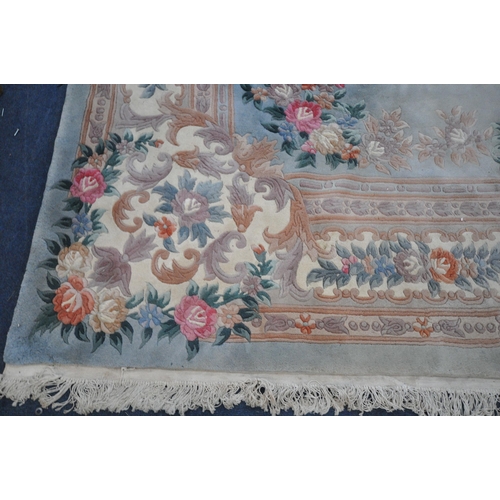 1326 - A VERY LARGE CHINESE WOOLLEN RUG, 540cm x 359cm (condition report: stains in various places, sides a... 