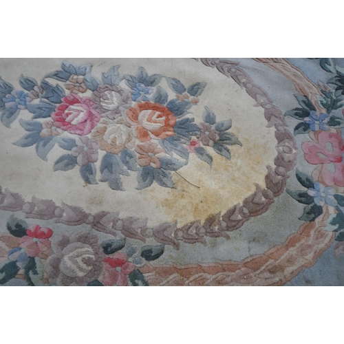 1326 - A VERY LARGE CHINESE WOOLLEN RUG, 540cm x 359cm (condition report: stains in various places, sides a... 