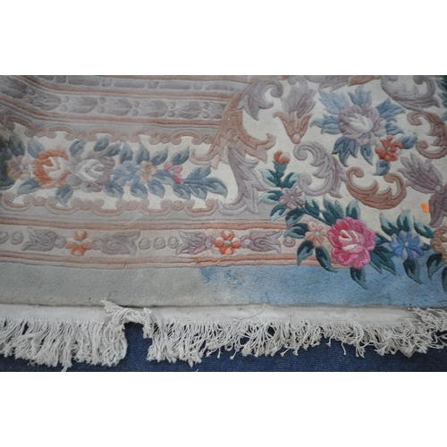 1326 - A VERY LARGE CHINESE WOOLLEN RUG, 540cm x 359cm (condition report: stains in various places, sides a... 