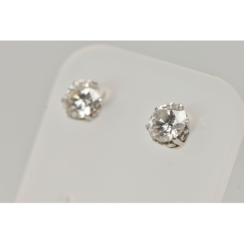 1 - A PAIR OF 18CT WHITE GOLD DIAMOND STUD EARRINGS, each round brilliant cut diamond in a six claw sett... 