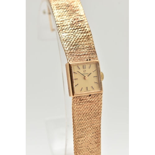 10 - A LADYS 9CT GOLD 'OMEGA' WRISTWATCH, manual wind, gold square dial signed 'Omega', baton markers, po... 