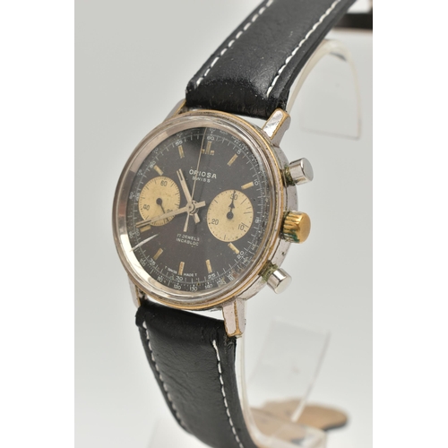 15 - A CHROME PLATED HAND WOUND ORIOSA TWIN DIAL CHRONOGRAPH WRISTWATCH, black dial with discoloured subs... 