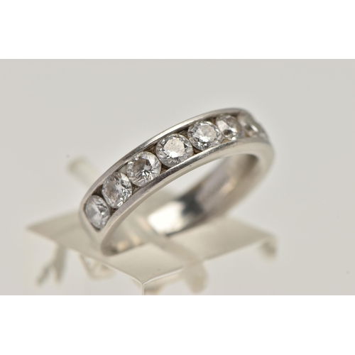 2 - A PLATINUM DIAMOND HALF ETERNITY RING, channel set with ten round brilliant cut diamonds, estimated ... 