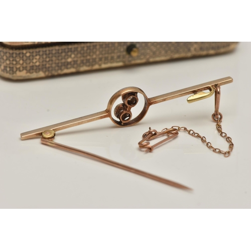 25 - A YELLOW METAL DIAMOND BAR BROOCH, polished bar with open work centre piece set with two old cut dia... 