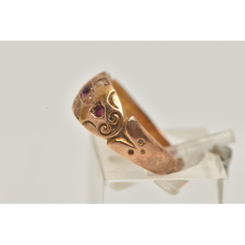 27 - A LATE VICTORIAN 15CT GOLD RUBY AND PEARL RING, flower detail to the centre set with a central ruby ... 