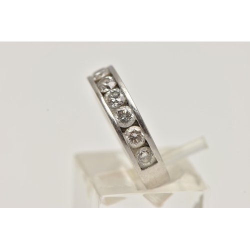 3 - A WHITE METAL, DIAMOND HALF ETERNITY RING, channel set with ten round brilliant cut diamonds, estima... 