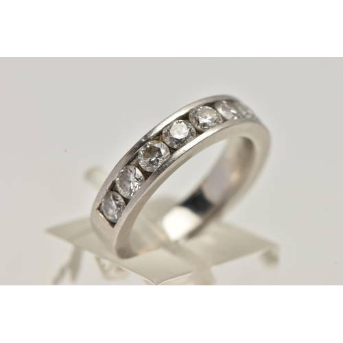 3 - A WHITE METAL, DIAMOND HALF ETERNITY RING, channel set with ten round brilliant cut diamonds, estima... 