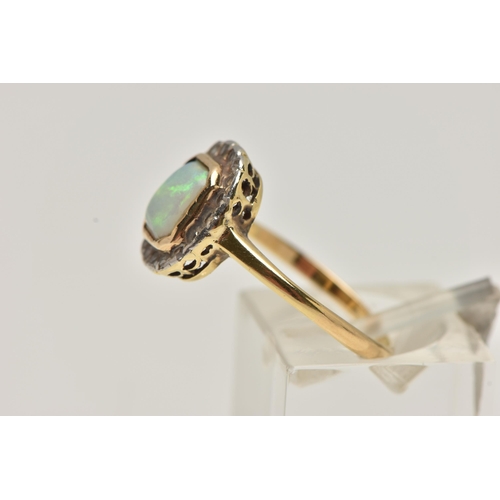 34 - A YELLOW METAL OPAL AND DIAMOND CLUSTER RING, of a rectangular form, centrally set with a rectangula... 