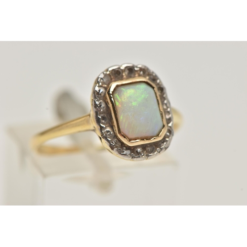 34 - A YELLOW METAL OPAL AND DIAMOND CLUSTER RING, of a rectangular form, centrally set with a rectangula... 