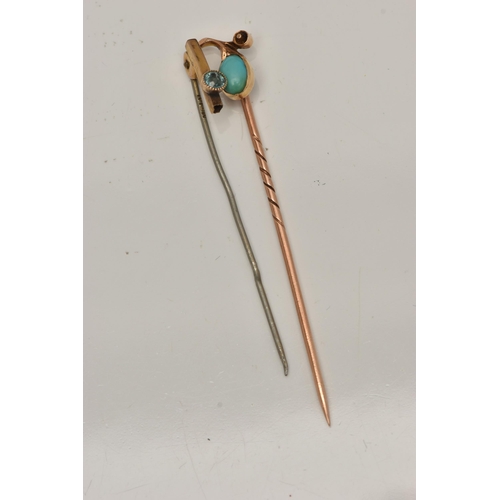 50 - A STICKPIN AND A BROKEN BROOCH, the stickpin set with an oval turquoise cabochon within a fruit shap... 