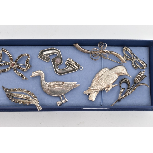 53 - A SELECTION OF SILVER AND WHITE METAL JEWELLERY, to include mainly brooches, two designed as birds, ... 