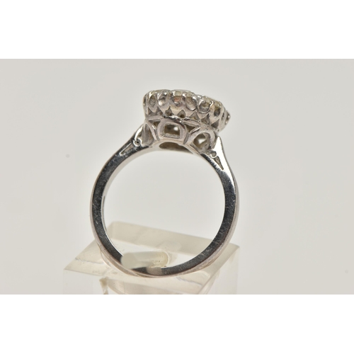 6 - AN 18CT WHITE GOLD DIAMOND CLUSTER RING, set with seven round brilliant cut diamonds, estimated tota... 