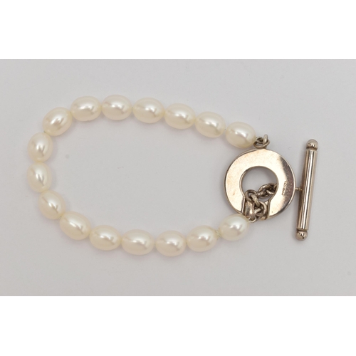 64 - A 'TIFFANY & CO' FRESH WATER PEARL TOGGLE BRACELET, a string of sixteen oval cultured fresh water pe... 