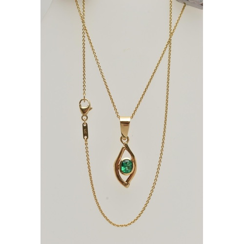 68 - AN EMERALD PENDANT, oval cut emerald, bezel set with an open work mount, large tapered bail, stamped... 