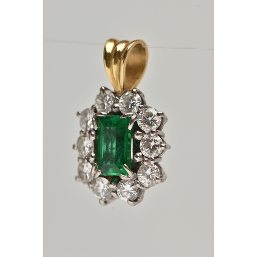 7 - AN EMERALD AND DIAMOND CLUSTER PENDANT, centrally set with a rectangular cut emerald, measuring appr... 