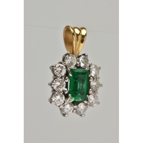 7 - AN EMERALD AND DIAMOND CLUSTER PENDANT, centrally set with a rectangular cut emerald, measuring appr... 