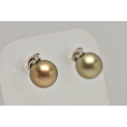 75 - A PAIR OF TAHITIAN PEARL EARRINGS AND A PENDANT, brown Tahitian pearl earrings with a round brillian... 