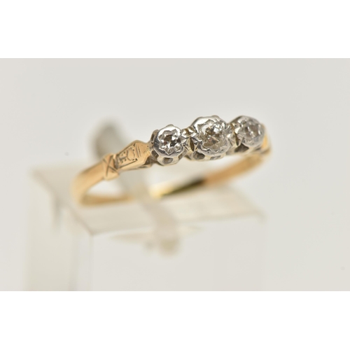 76 - A THREE STONE DIAMOND RING, a principle round brilliant cut diamond with two single cut diamonds, pr... 