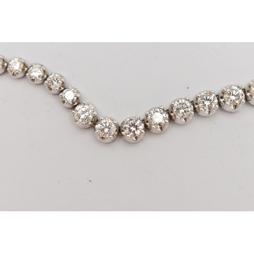 9 - A DIAMOND LINE NECKLACE, designed as a row of graduated claw set, round brilliant cut diamonds, esti... 