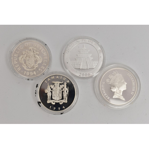 111 - A BAG OF COINS, to include a cased silver 1992 Two Dollar Bermuda Elizabeth II coin in a protective ... 