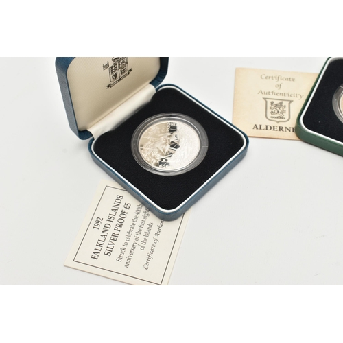 117 - THREE CASED SILVER COINS, to include a 1992 Falkland Islands silver proof £5, a Bicentenary of the B... 