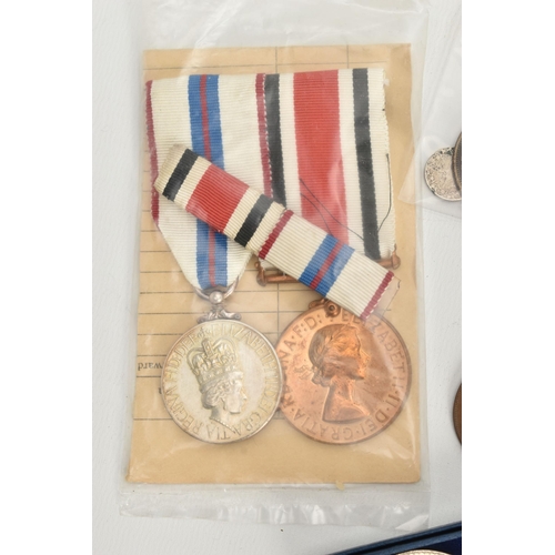 157 - A SMALL BOX OF COINS, to include a pair of Faithful Service Police Medals to Trevor C Jones, includi... 