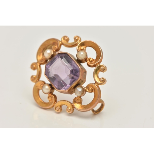 81 - A YELLOW METAL AMETHYST AND SEED PEARL BROOCH, open work scrolling brooch set with a central emerald... 