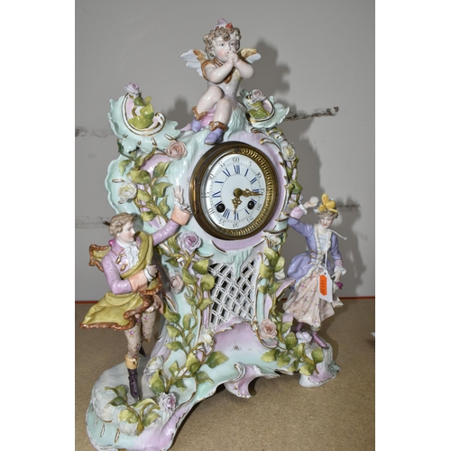 333 - TWO LATE 19TH CENTURY CONTINENTAL PORCELAIN CASED FIGURAL MANTEL CLOCKS, comprising a floral encrust... 