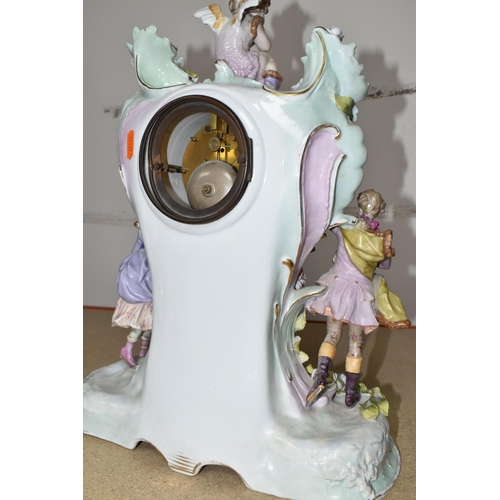 333 - TWO LATE 19TH CENTURY CONTINENTAL PORCELAIN CASED FIGURAL MANTEL CLOCKS, comprising a floral encrust... 