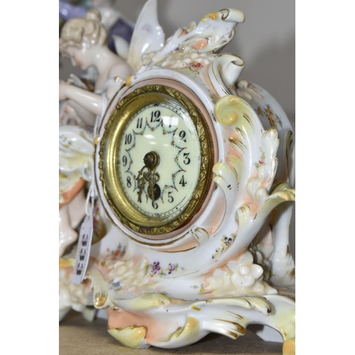 333 - TWO LATE 19TH CENTURY CONTINENTAL PORCELAIN CASED FIGURAL MANTEL CLOCKS, comprising a floral encrust... 