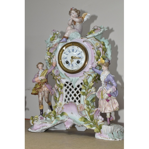 333 - TWO LATE 19TH CENTURY CONTINENTAL PORCELAIN CASED FIGURAL MANTEL CLOCKS, comprising a floral encrust... 